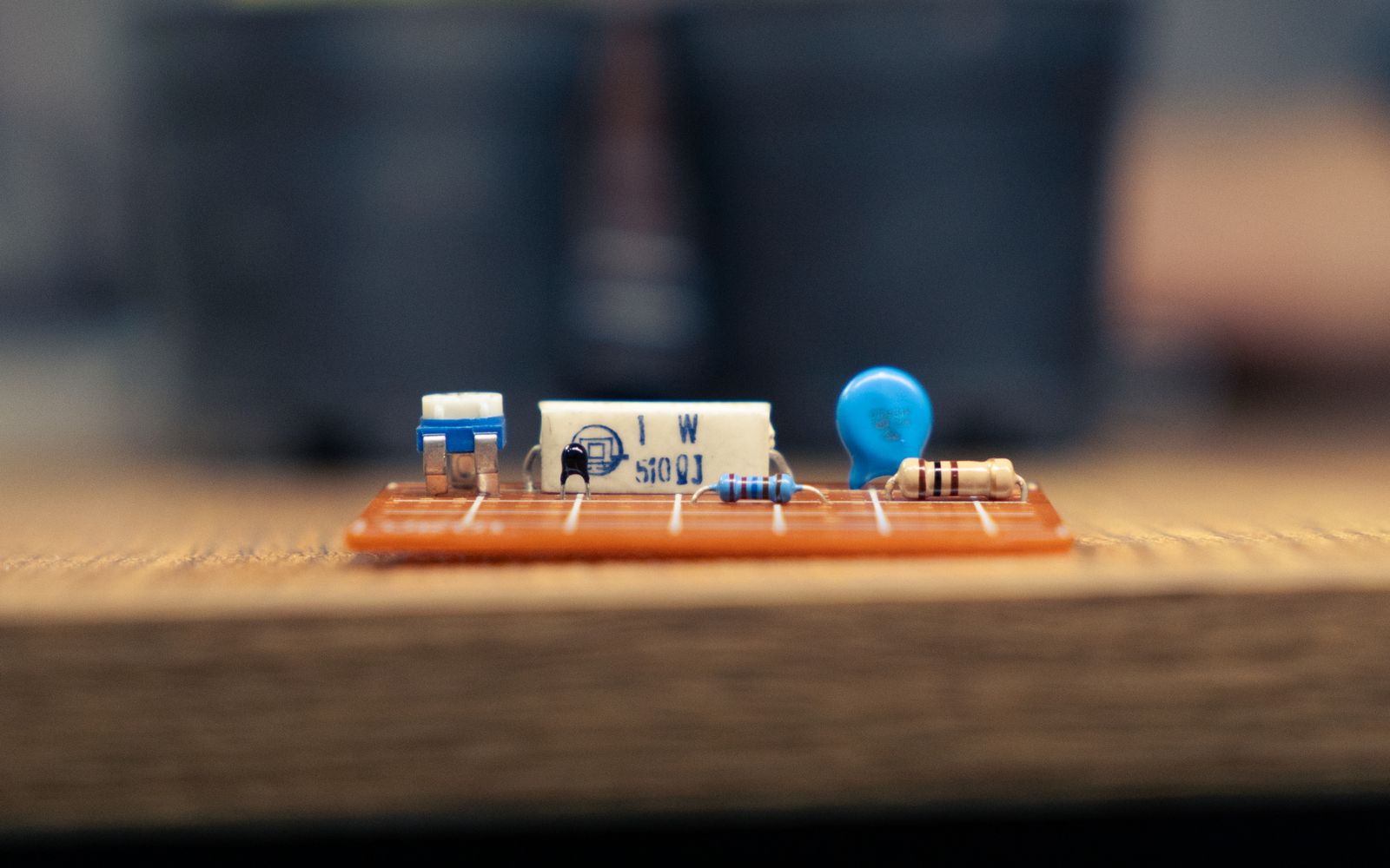Close-up of an electronic circuit board with resistors and capacitors