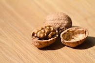 Close-Up of Walnuts on Wooden Surface