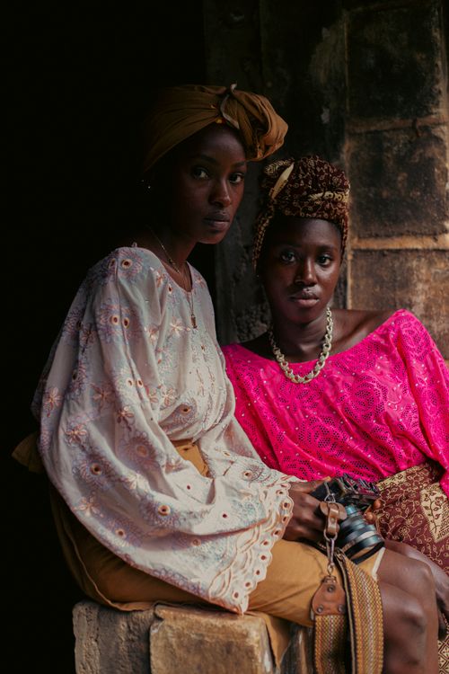 Elegant Portrait of Two Women in Traditional Attire · Free Stock Photo