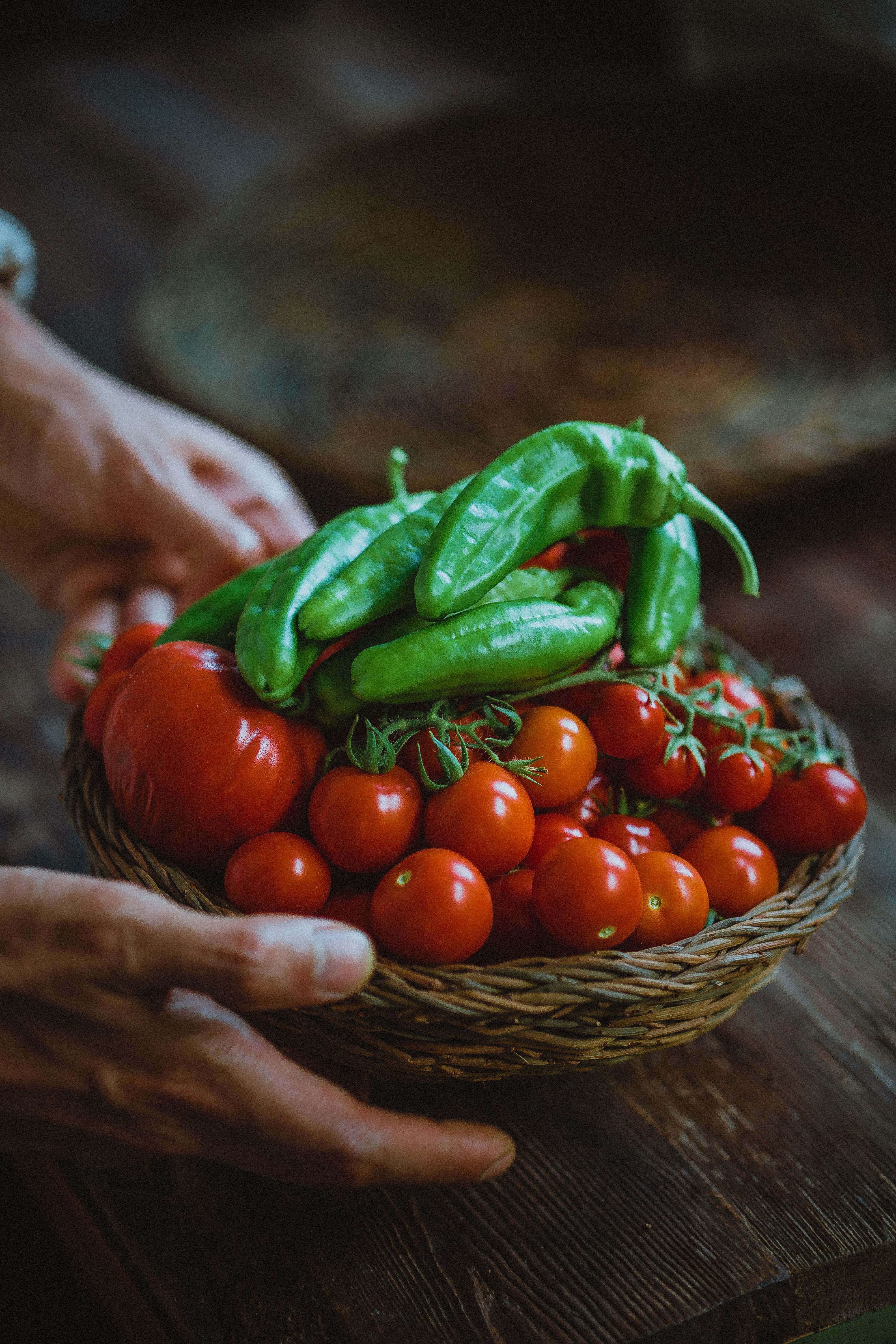 Close-up of Fresh Tomatoes and Peppers in Basket · Free Stock Photo