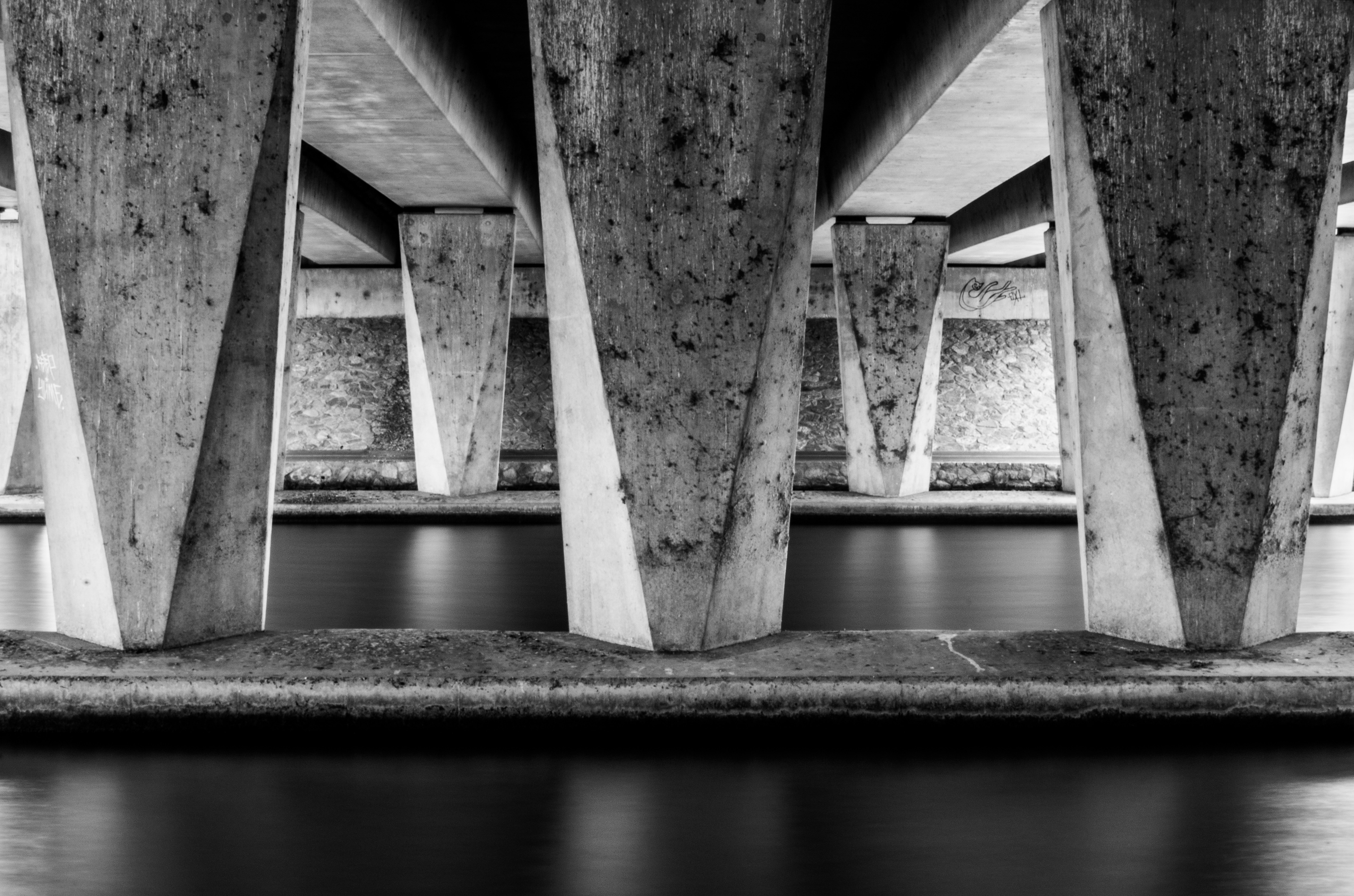 Pier and beam foundation repair in Littleton showing wooden beams and concrete piers supporting a residential structure
