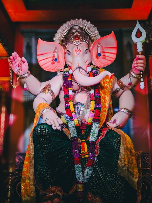 Free Vibrant Lord Ganesha idol decorated for the Ganesh Chaturthi festival in Mumbai, India. Stock Photo