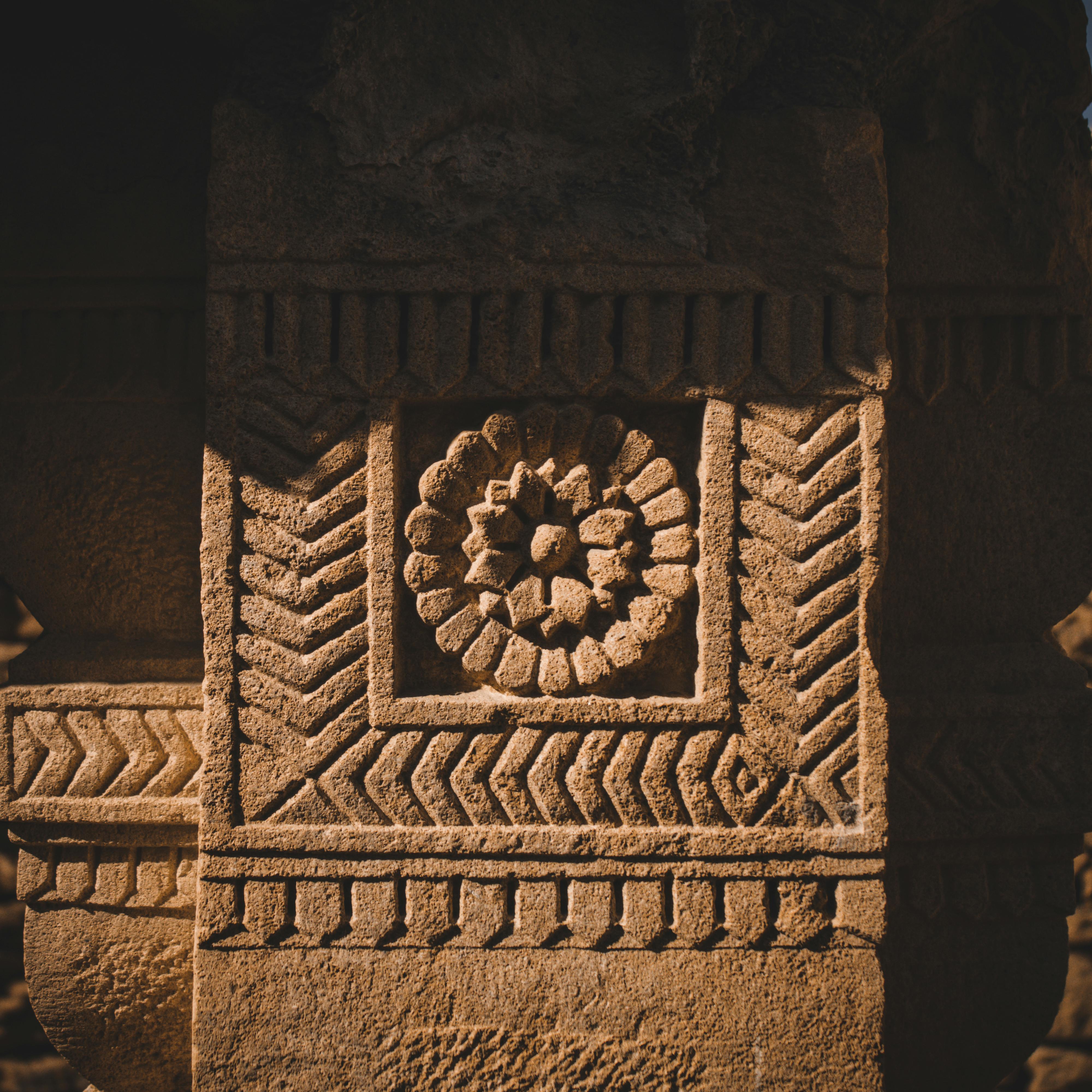 Detailed sandstone carving captured in the warm light, showcasing Indian heritage in Jaisalmer, Rajasthan.
