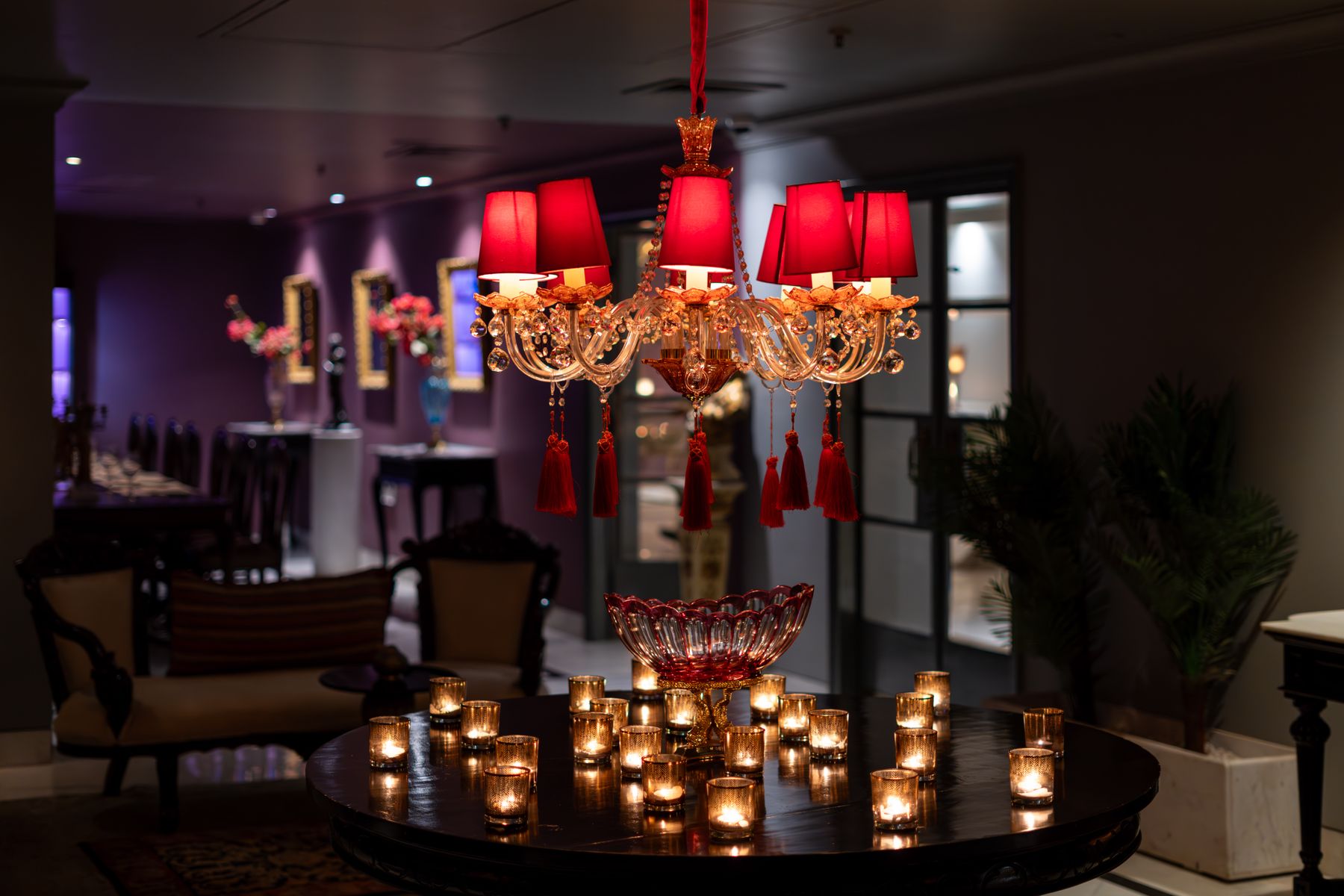 Luxury Indian restaurant interior with warm candlelit ambience