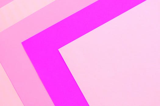 Vibrant abstract image featuring geometric pink patterns with a modern aesthetic.
