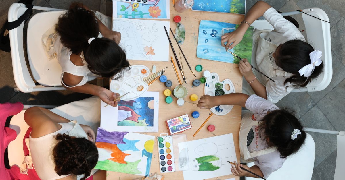 children working together on a group project in a classroom