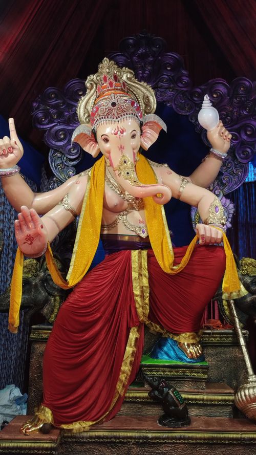 Free Vibrant Ganesh idol decorations in Mumbai celebrating Ganesh Chaturthi. Stock Photo