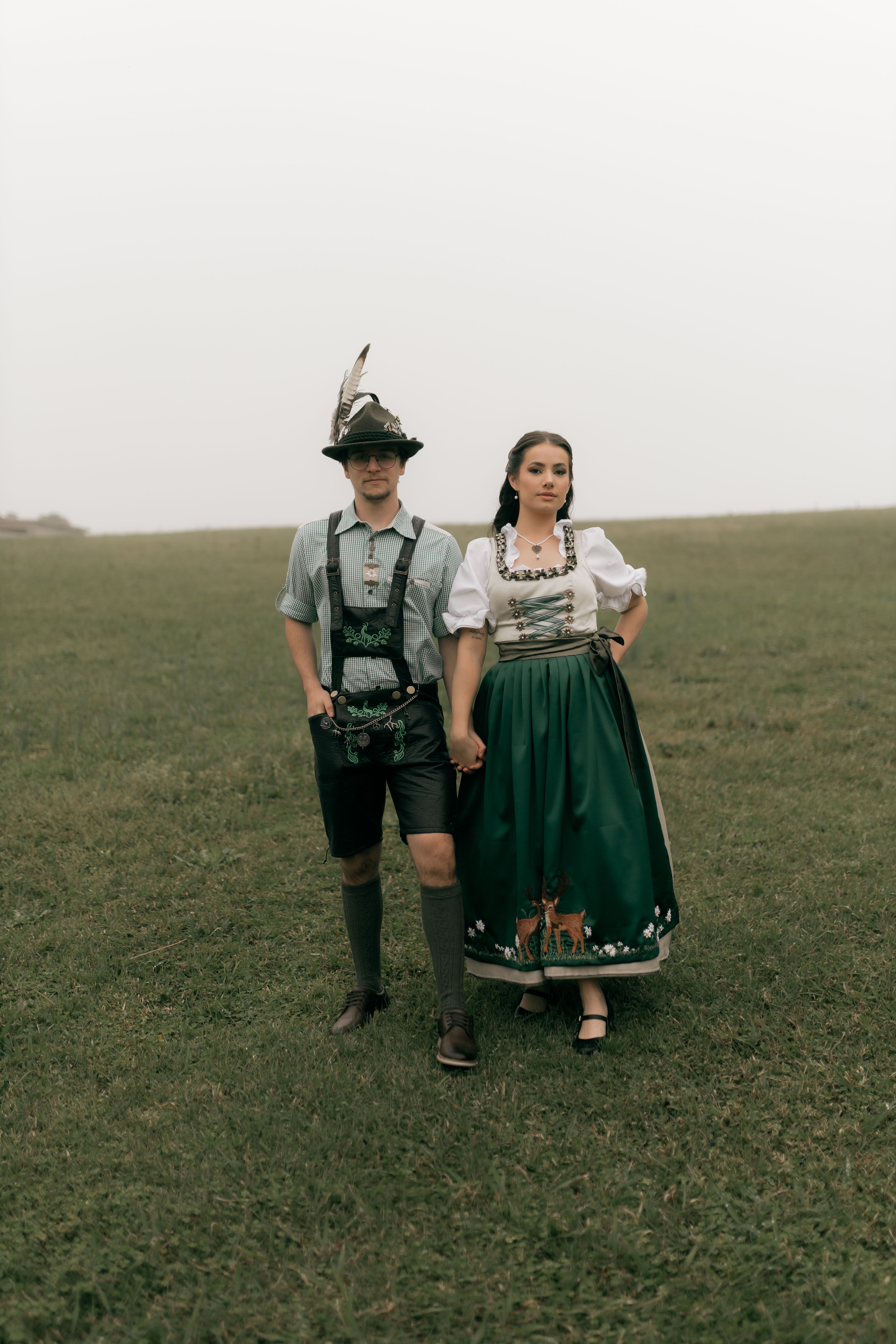 Couple in lederhosen and dirndl