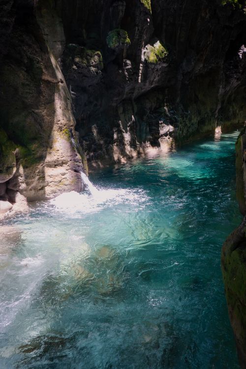 Free Discover the breathtaking turquoise waters of a natural canyon in Mexico. Stock Photo