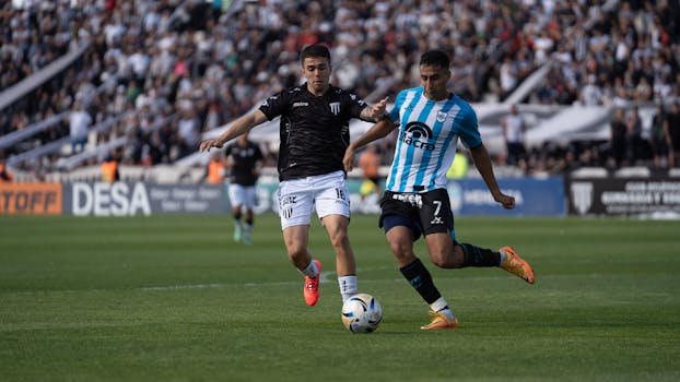 Exciting moment during a soccer match with players competing fiercely on the field.