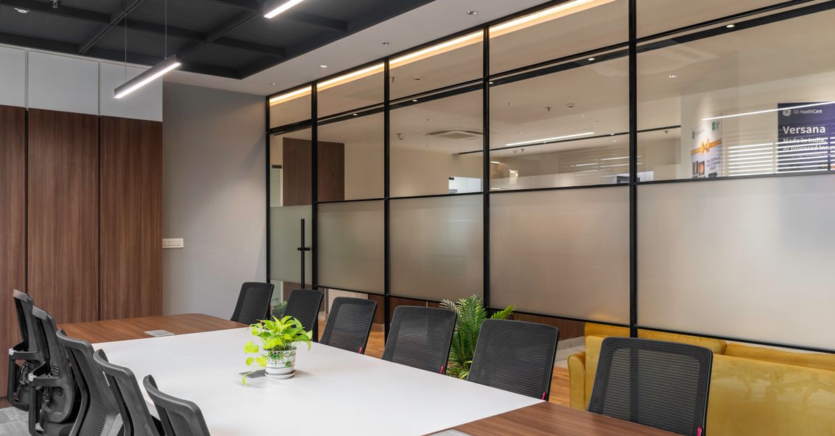 Spacious, modern conference room with sleek design and vibrant décor in a contemporary office space.