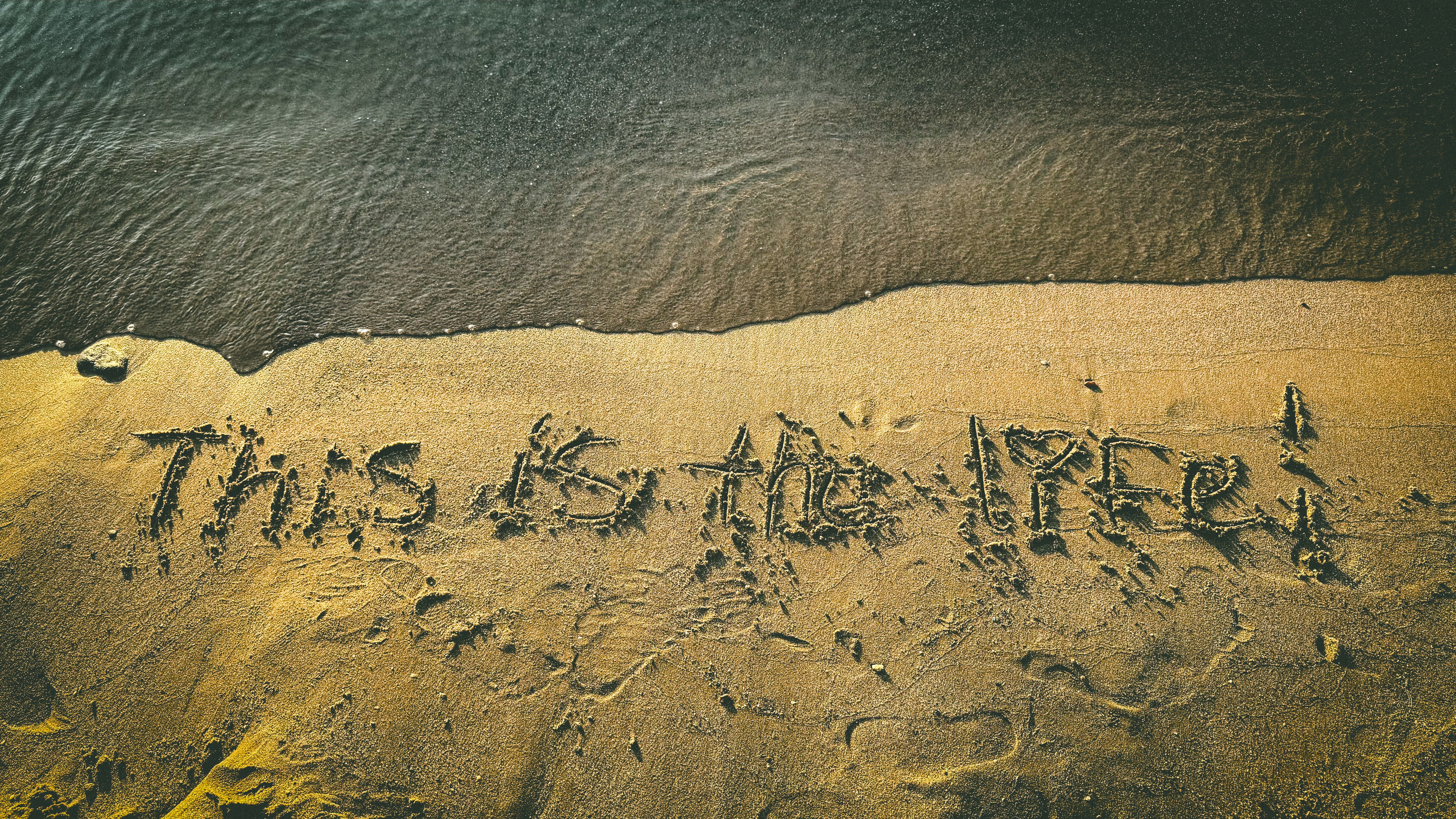 Inspiring Message Etched in Beach Sand · Free Stock Photo