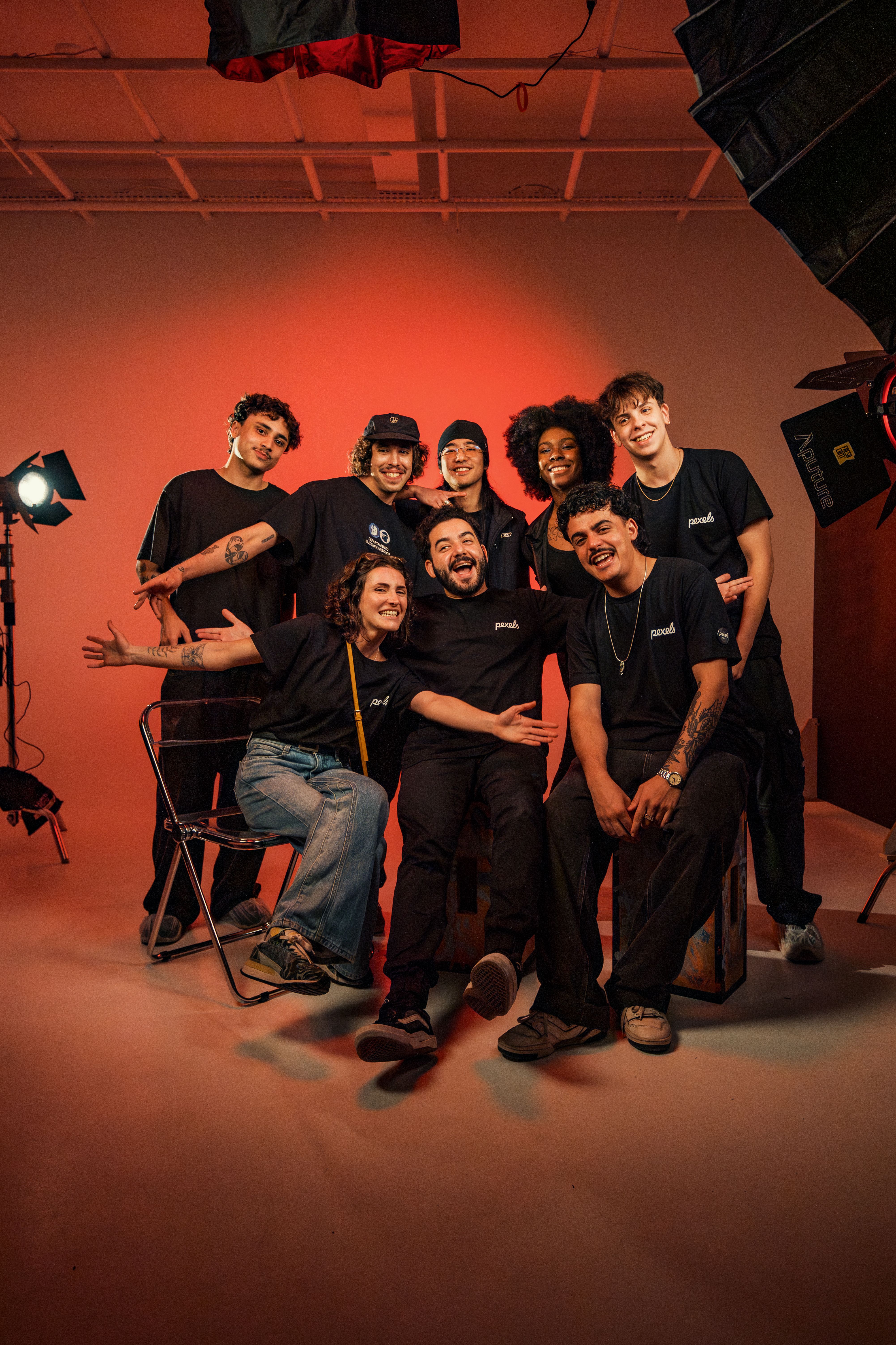Group of Friends Posing in Photography Studio · Free Stock Photo