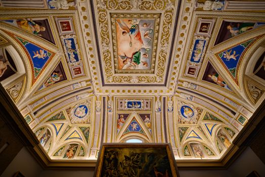 Stunning Renaissance ceiling fresco with vibrant colors and detailed artistry in Madrid, Spain.