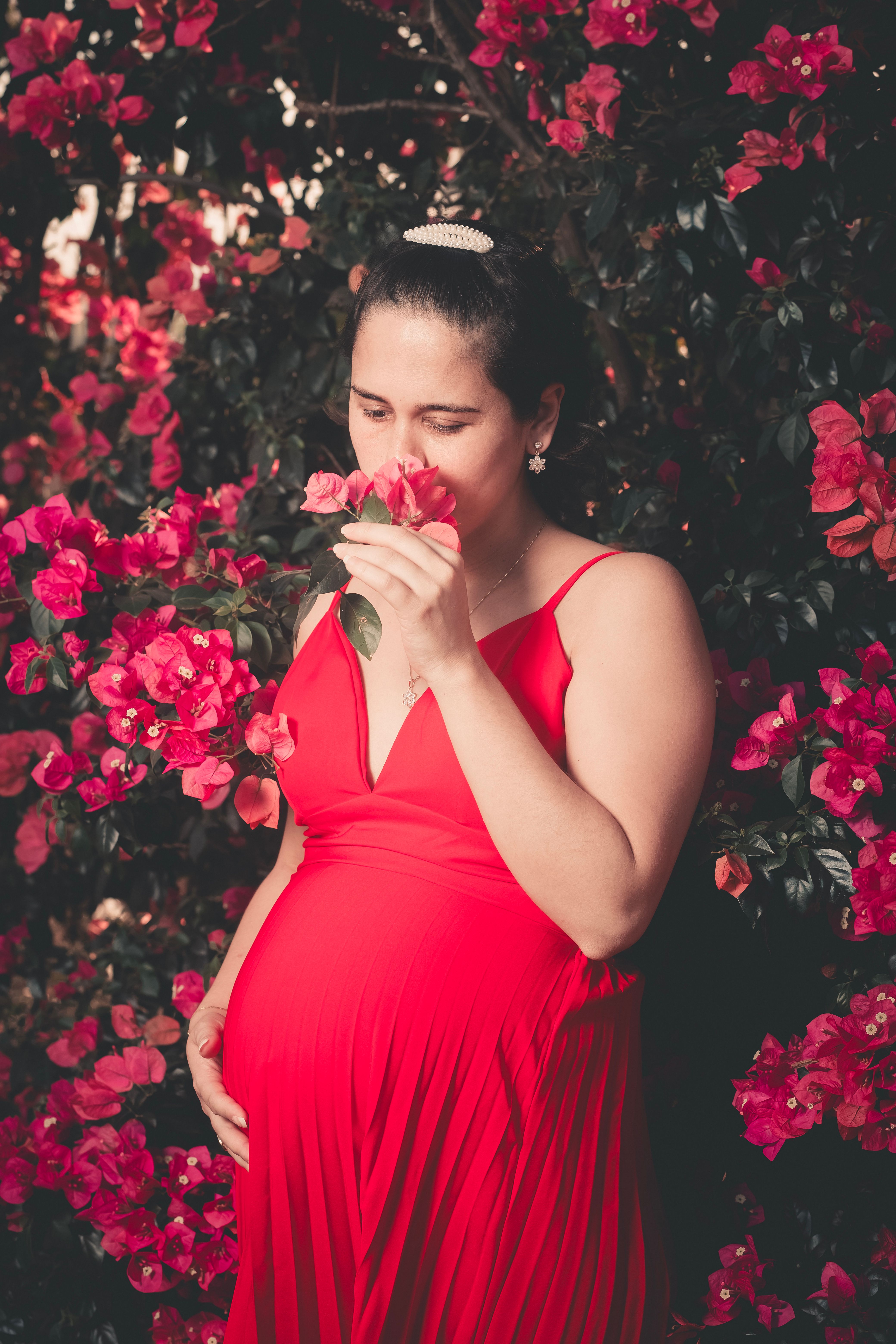pregnant woman in red dress Sexy High Neck Cutout Long Sleeves Maternity Dress