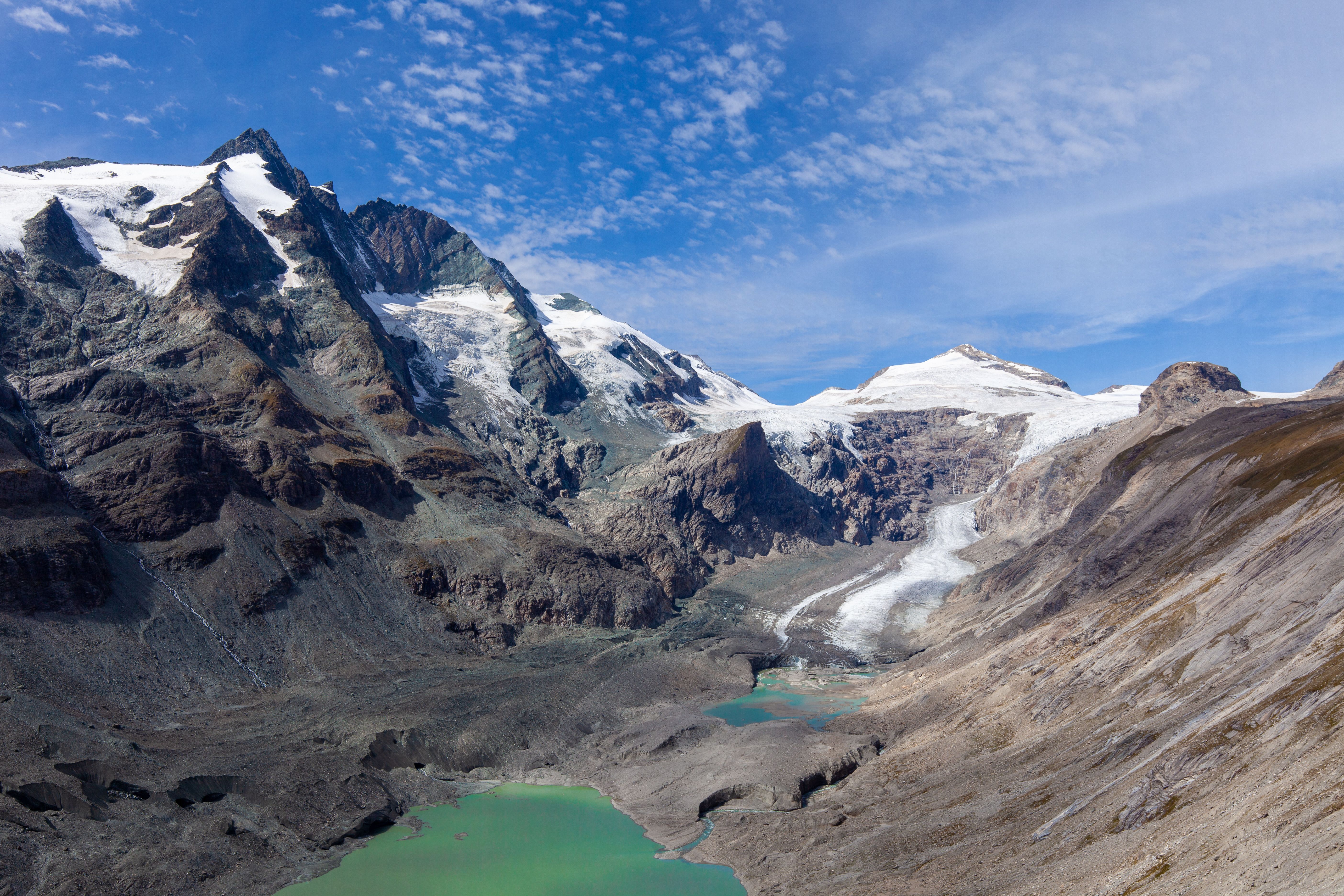 Austrian Alps with Glacial River During Daytime · Free Stock Photo