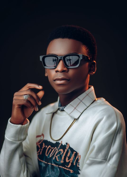 Stylish Portrait of a Young Man with Sunglasses · Free Stock Photo