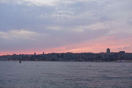 Free Beautiful view of Istanbul's skyline during sunset, showcasing the Bosphorus and vibrant hues in the evening sky. Stock Photo