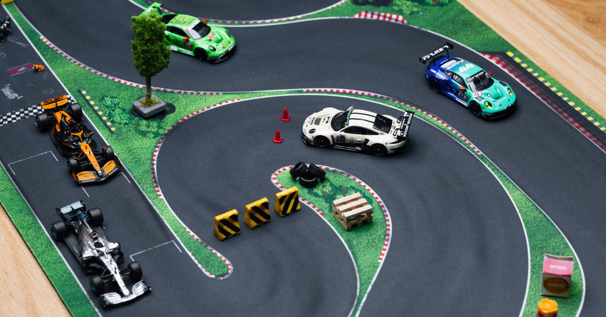 Random Track Car Colorful Diecast Racing Cars on Miniature Track · Free Stock Photo