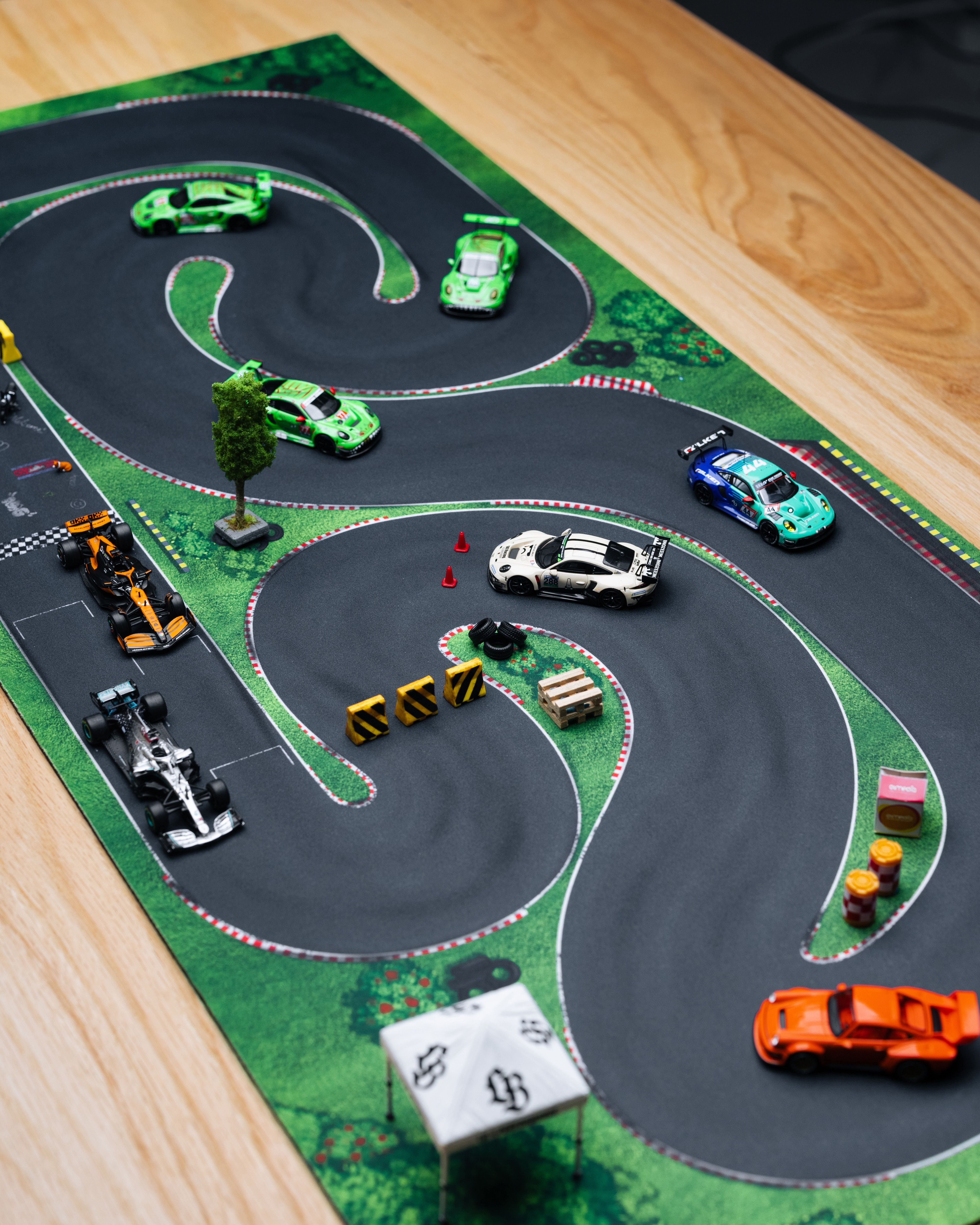 Colorful Diecast Racing Cars on Miniature Track · Free Stock Photo