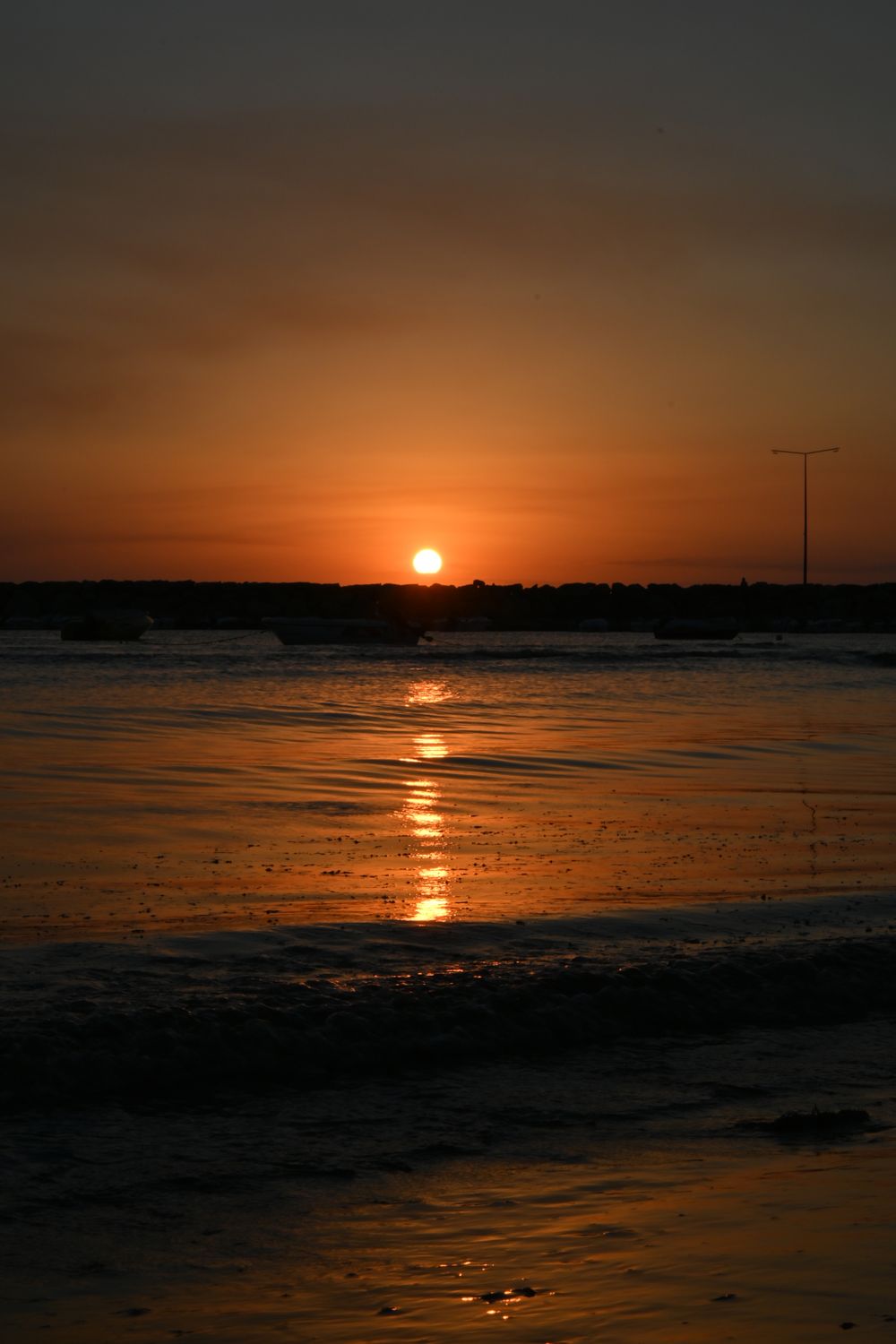 Beautiful Sunset Over Calm Ocean Waves · Free Stock Photo