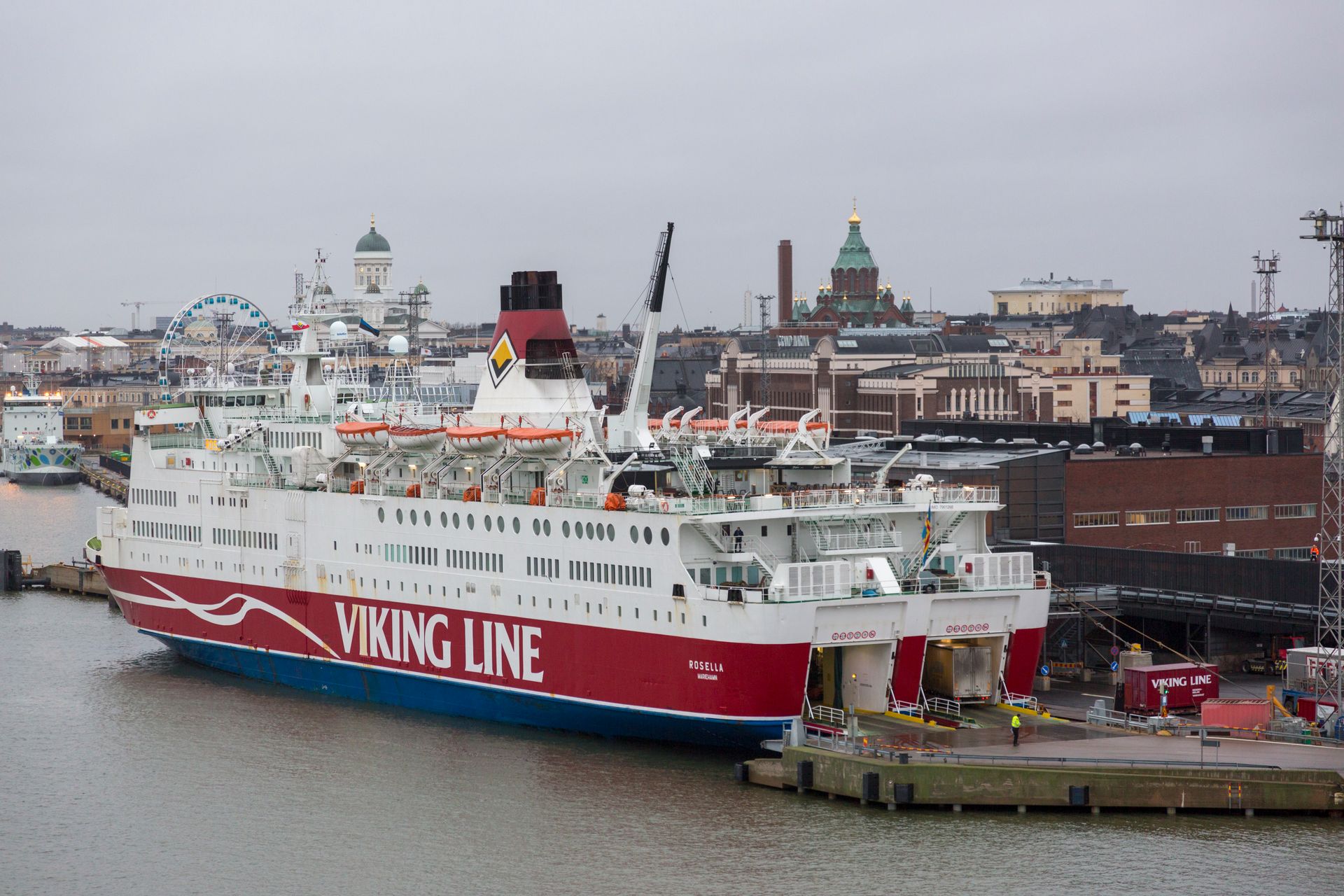 Viking Line ferry at Helsinki, showcasing city's skyline with notable landmarks.
