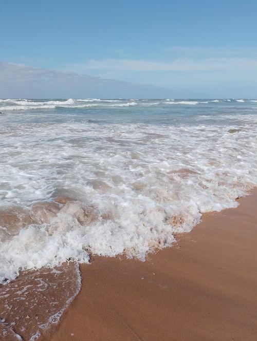 Free Stunning view of the Atlantic Ocean waves meeting the beach in Casablanca, Morocco. Stock Photo