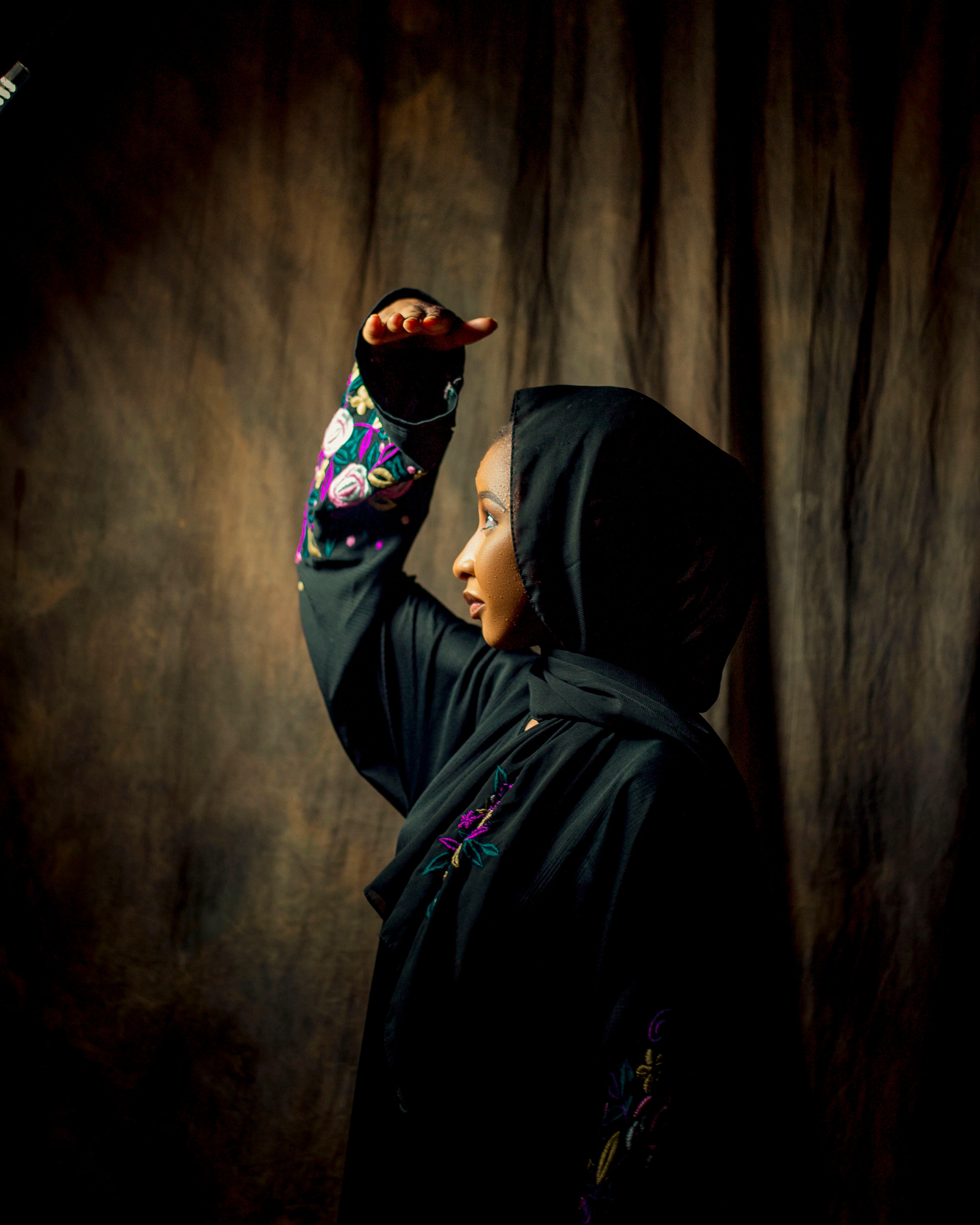 Portrait of Woman in Traditional Black Headscarf · Free Stock Photo