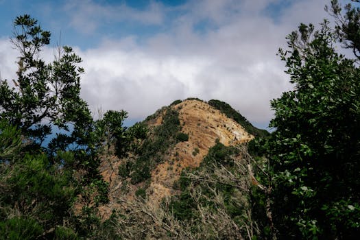 Explore the rugged beauty of Vallehermoso's volcanic hills in the Canary Islands.