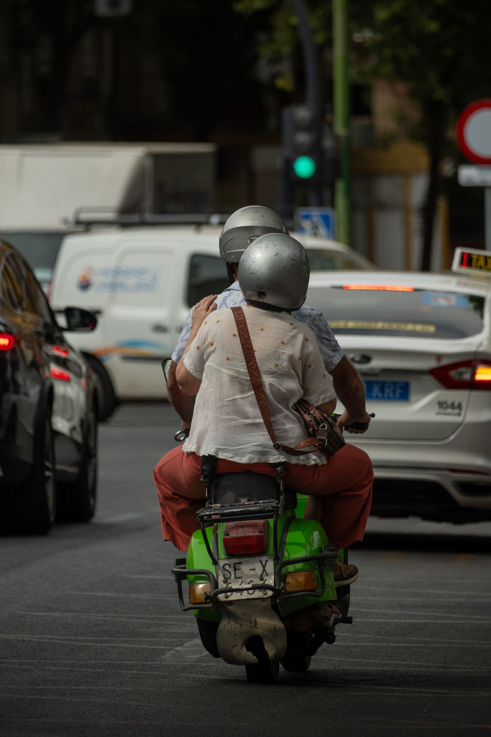 Motorcycle rider travelling on an open road with riding equipment