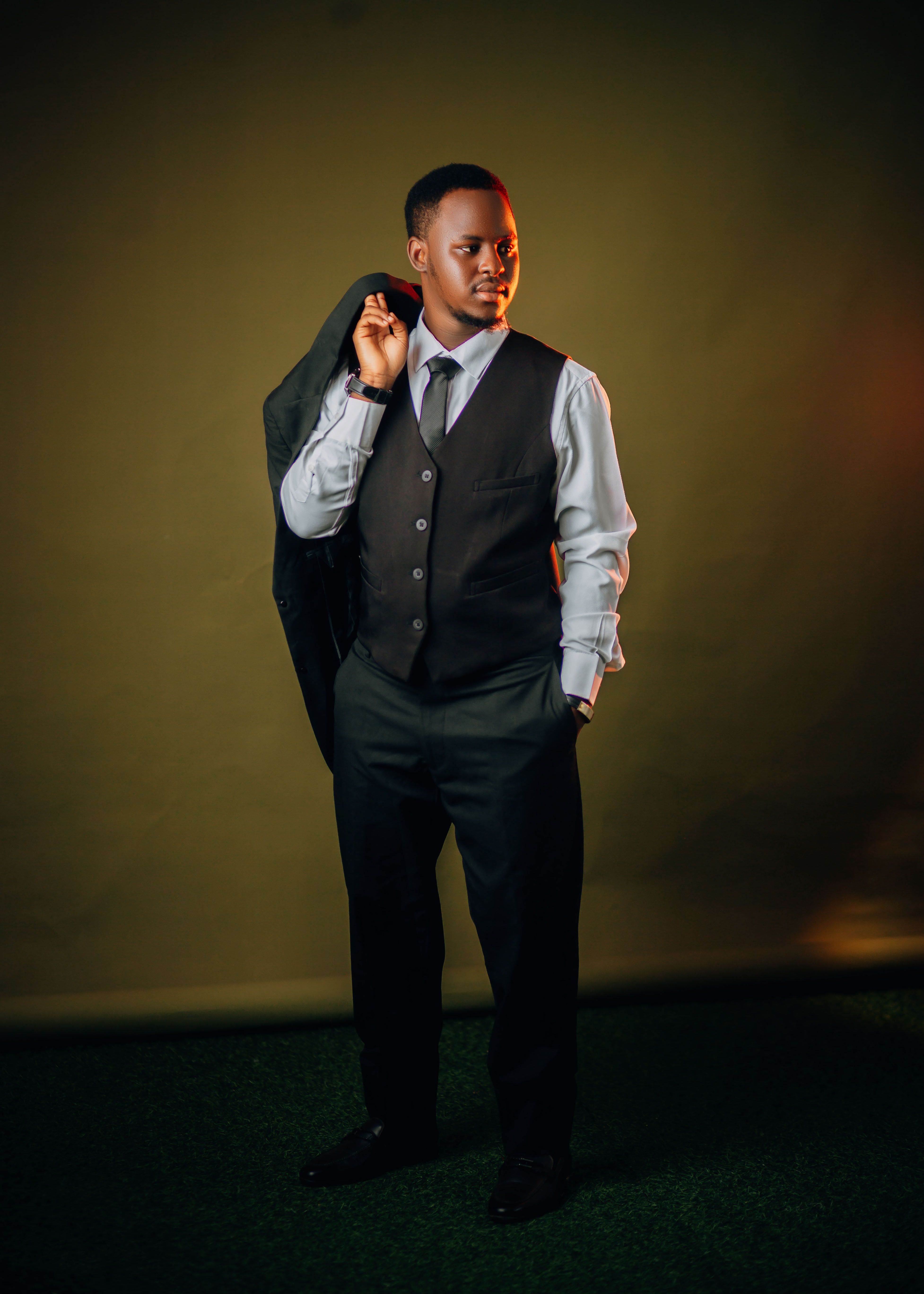Stylish Young Man in Formal Attire Posing Confidently  Free Stock Photo