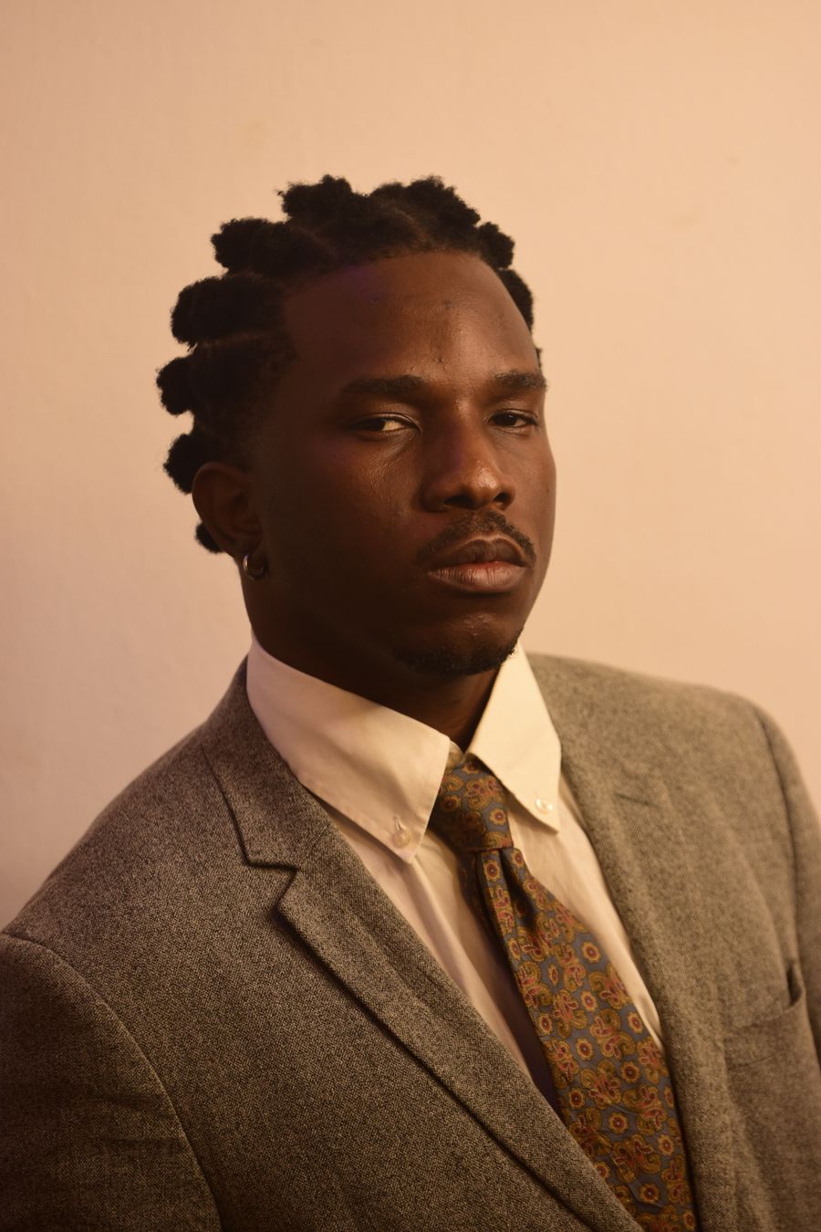 Professional headshot placeholder for Daniel Asante
