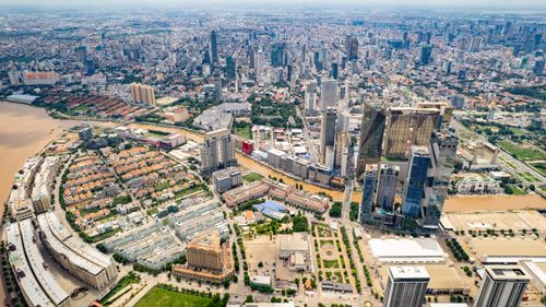 Free Breathtaking aerial shot of Phnom Penh's modern skyline and bustling urban landscape. Stock Photo