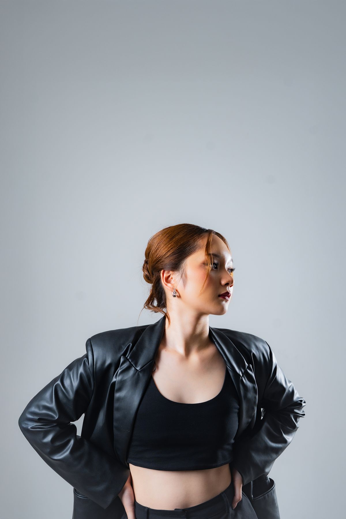 Stylish portrait of a woman in a black leather jacket