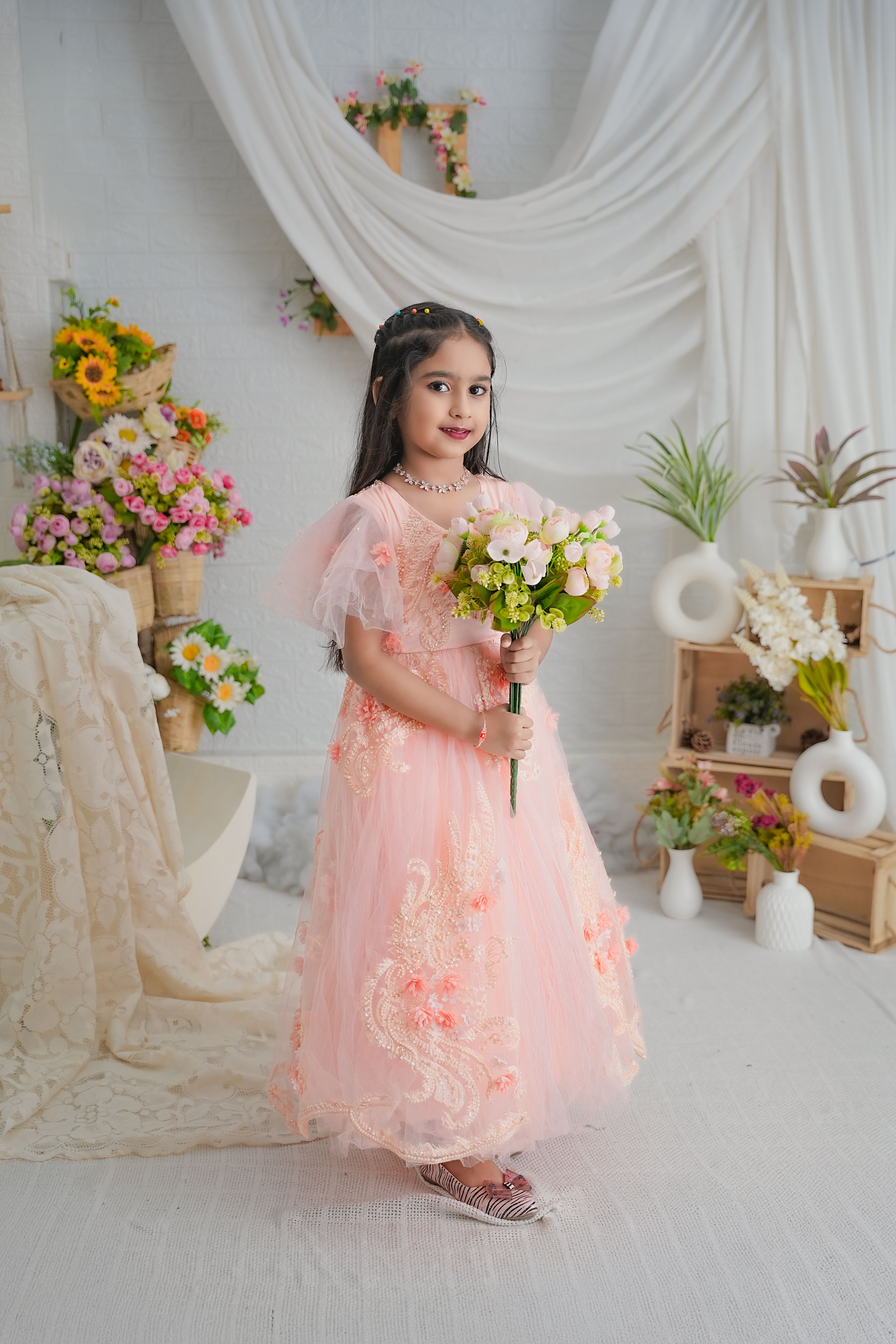 Little Girl in Pink Dress Holding Flowers · Free Stock Photo
