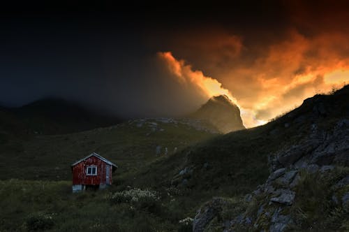 Storm Clouds at Sunrise in Mountains 