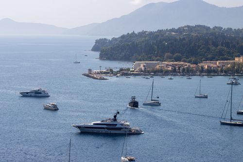 Free Stunning aerial view of yachts sailing near Corfu, Greece, with lush greenery and blue waters. Stock Photo