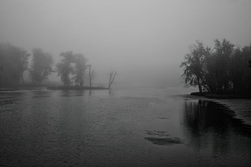 Free A moody, foggy river landscape captured in Nelson, Wisconsin. Stock Photo