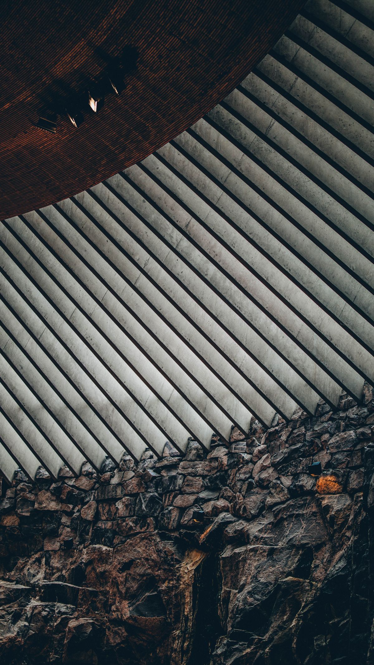 Modern interior with textured wall and decorative slats