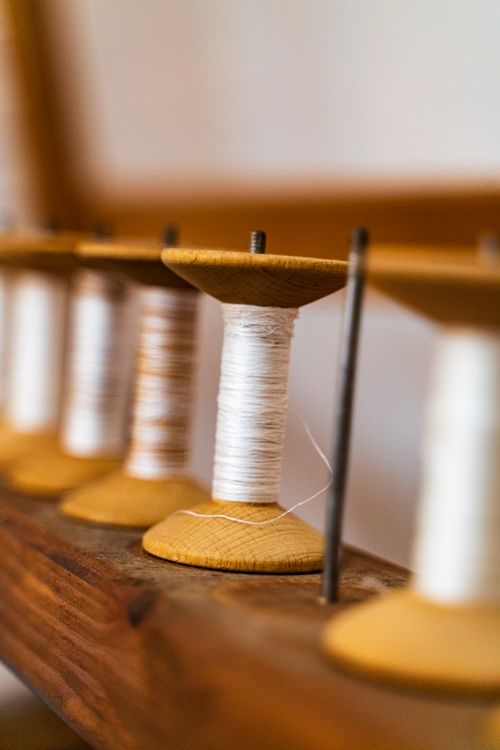 Close-up of Wooden Yarn Spools in Alanya · Free Stock Photo