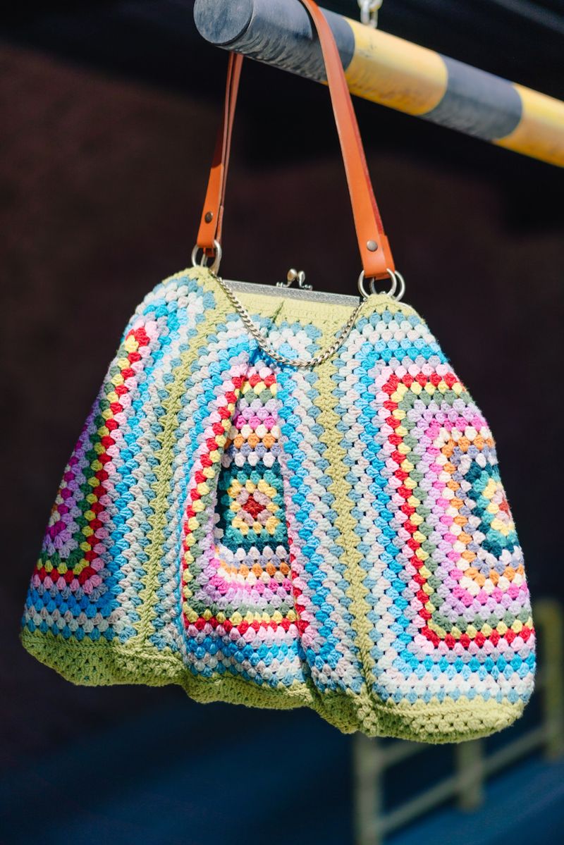 Colorful crochet granny square handbag with leather straps