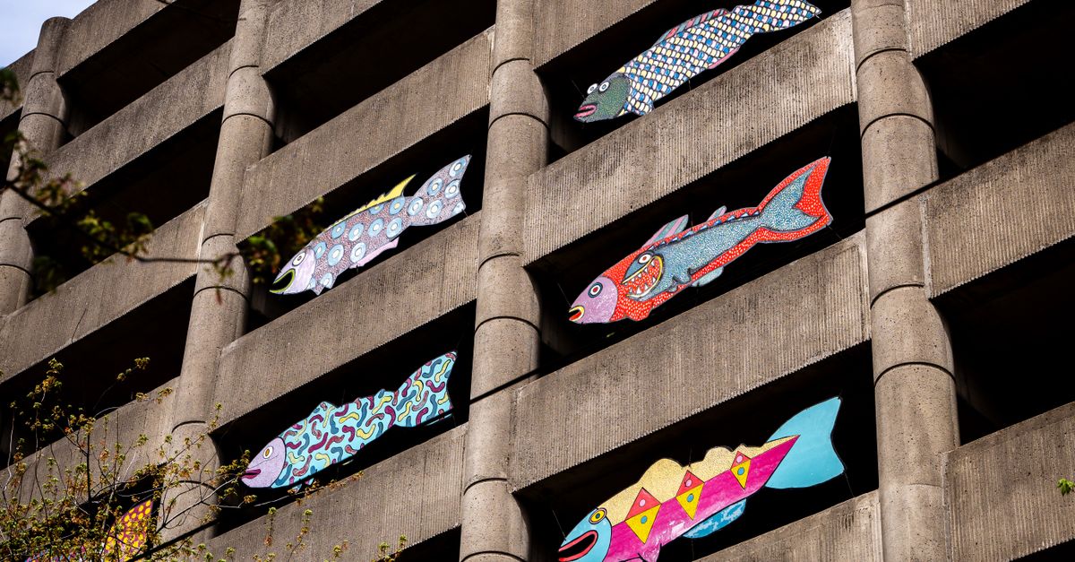 Portland Fish Sign Colorful fish murals on Portland building facade · Free Stock Photo
