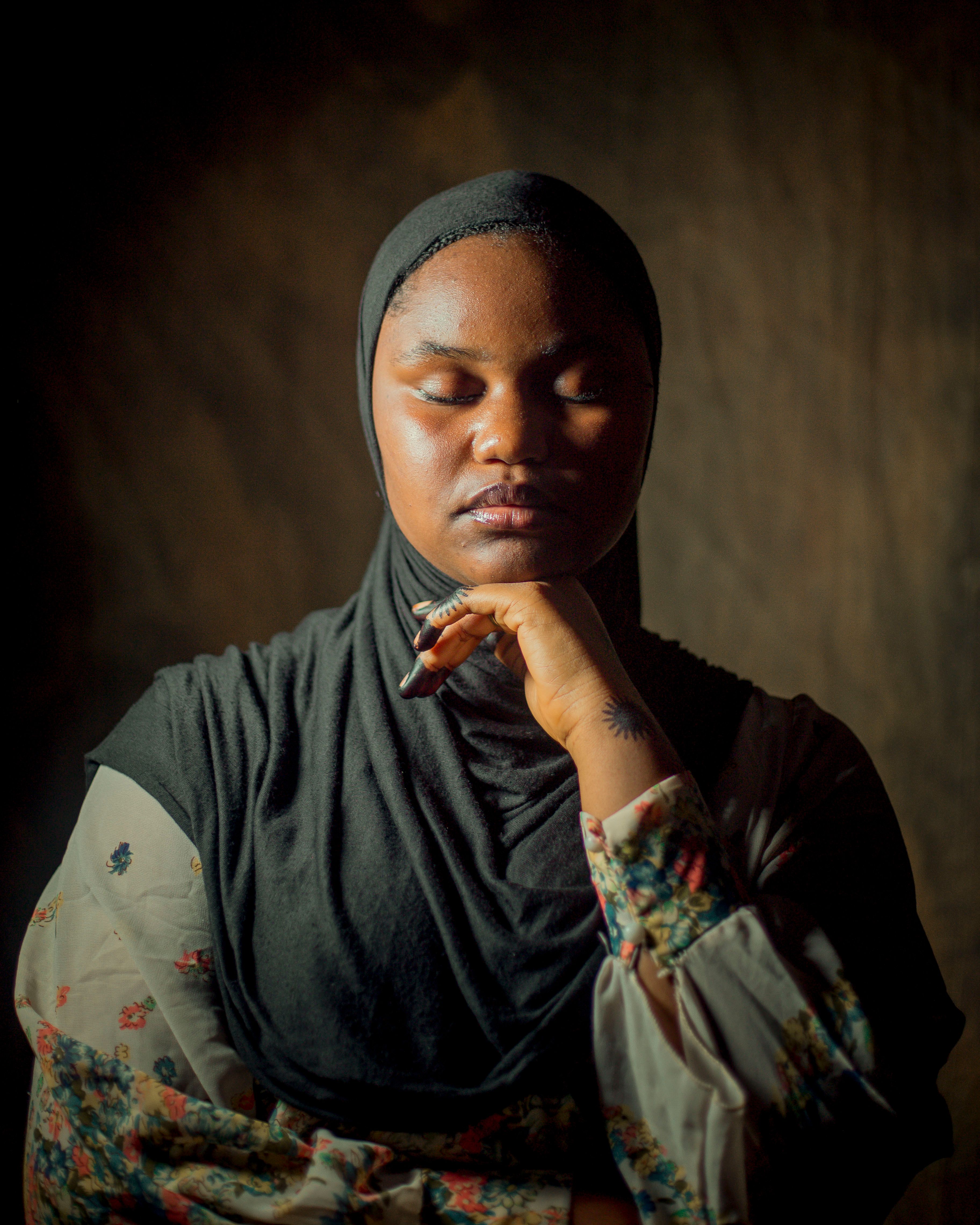 Contemplative Portrait of a Woman in Hijab · Free Stock Photo