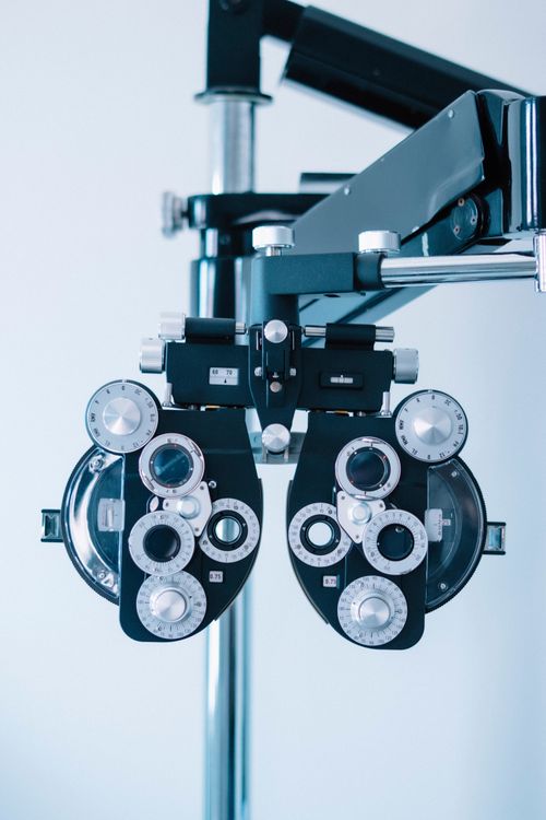 Optometry Computer Background Jpeg Optometry Equipment on Blue Background · Free Stock Photo