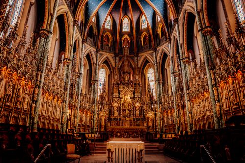 Free Stunning view of a cathedral interior showcasing elaborate Gothic architecture and intricate details. Stock Photo