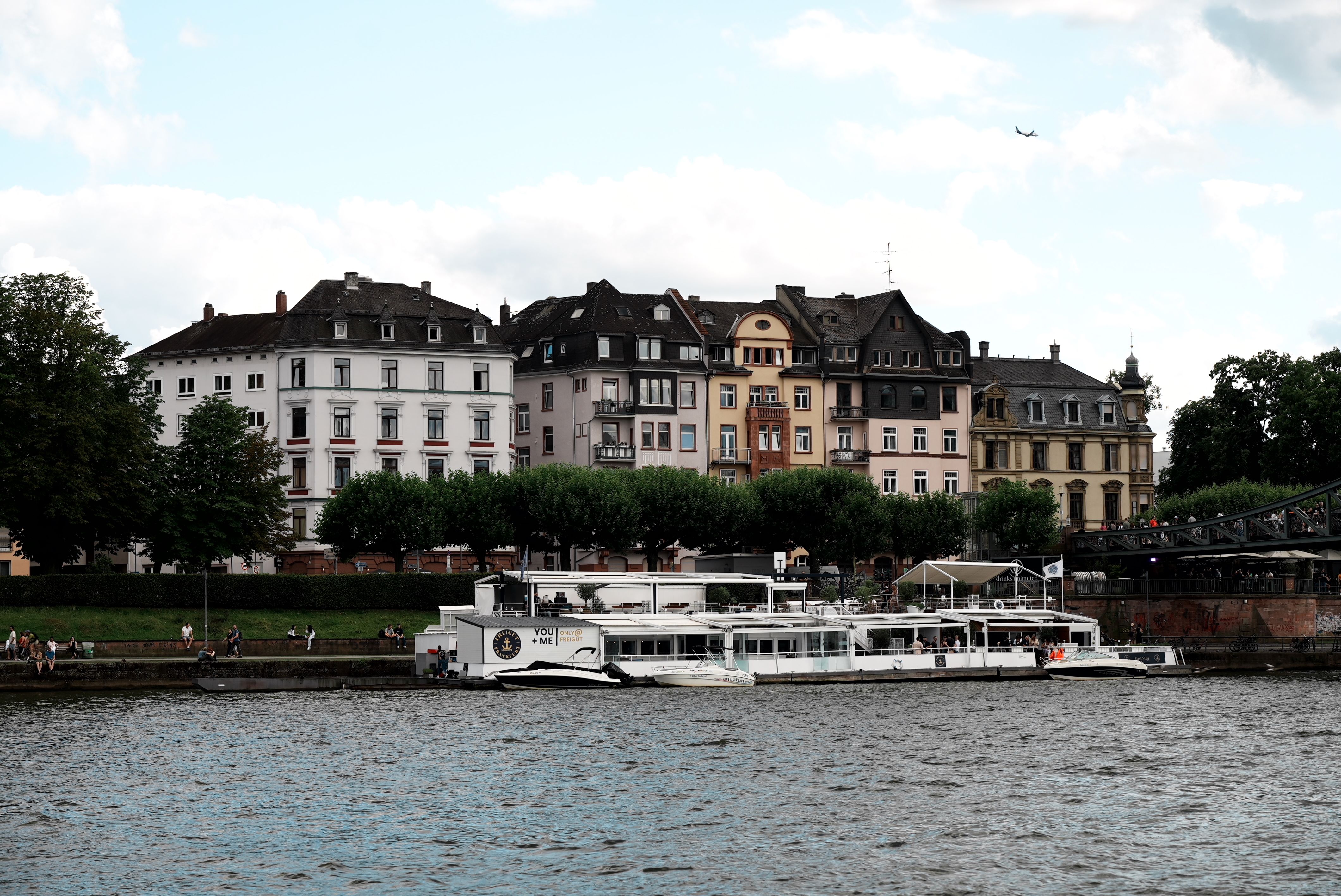Charming Riverside View of Historical Architecture · Free Stock Photo