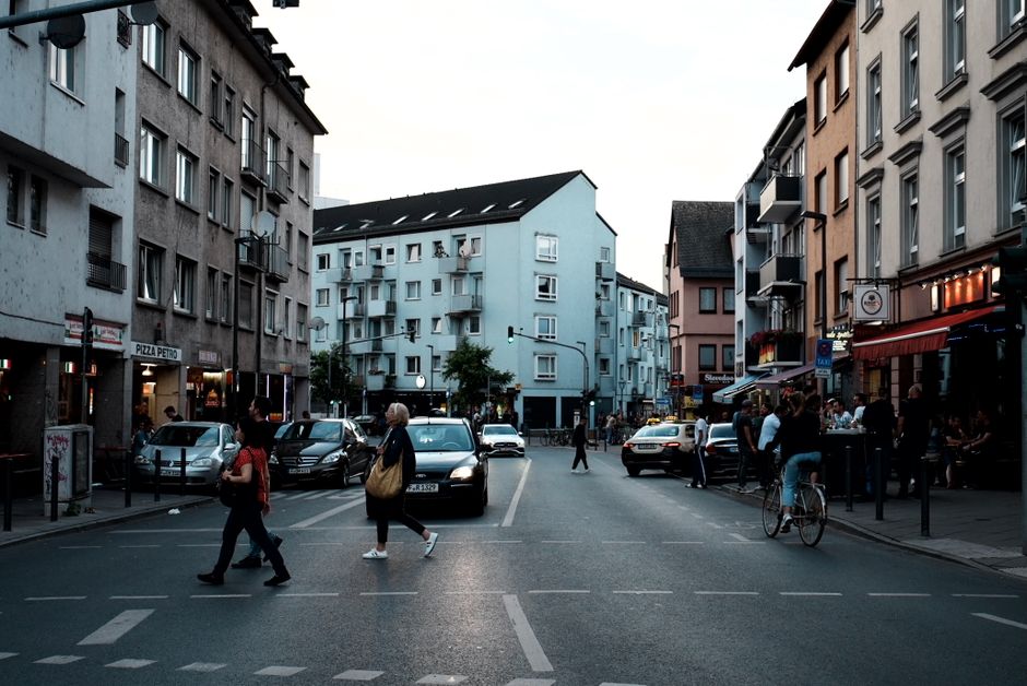 diverse people residential street dusk