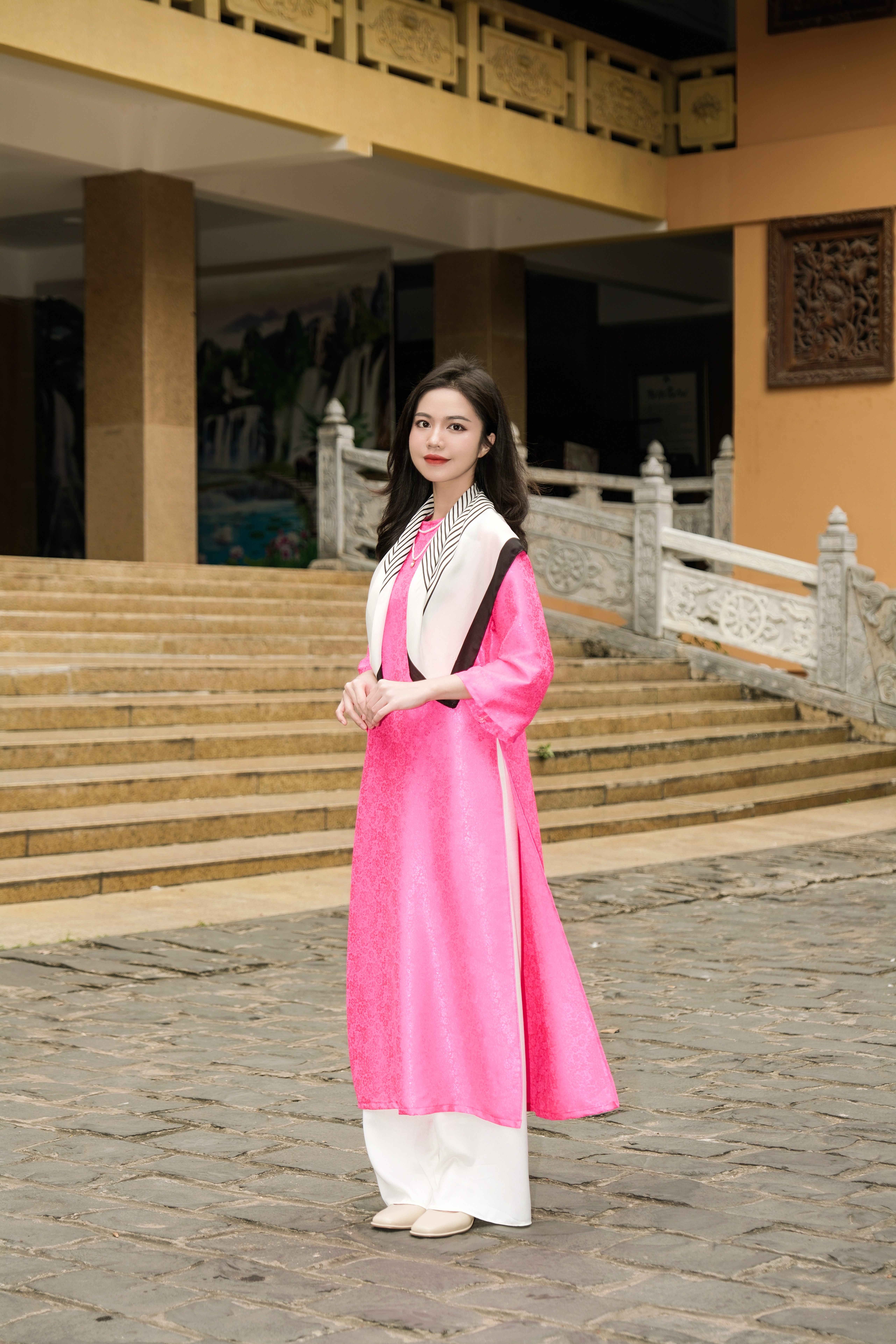 Elegant Woman in Traditional Pink Dress Outdoors · Free Stock Photo