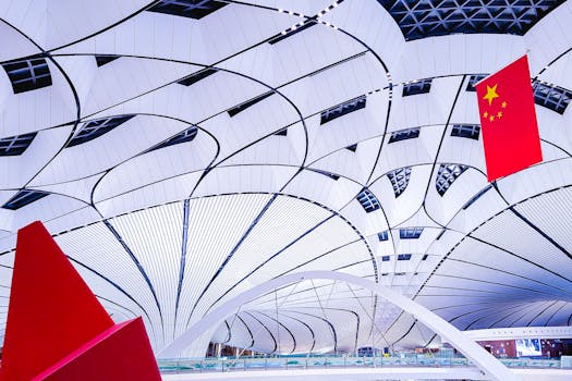 Explore the sleek and modern architectural design of Beijing Airport's interior with its iconic features and vibrant ambiance.