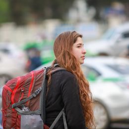 Traveller with a backpack in the city — photo by Son Hoa Nguyen on Pexels